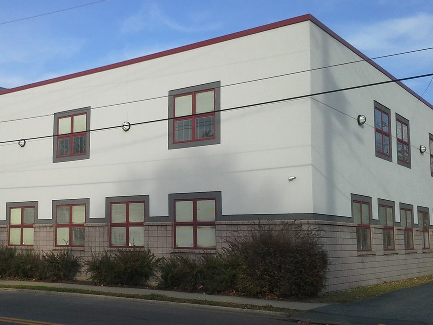 Commercial property with tenant in place, symbolizing sale-leaseback